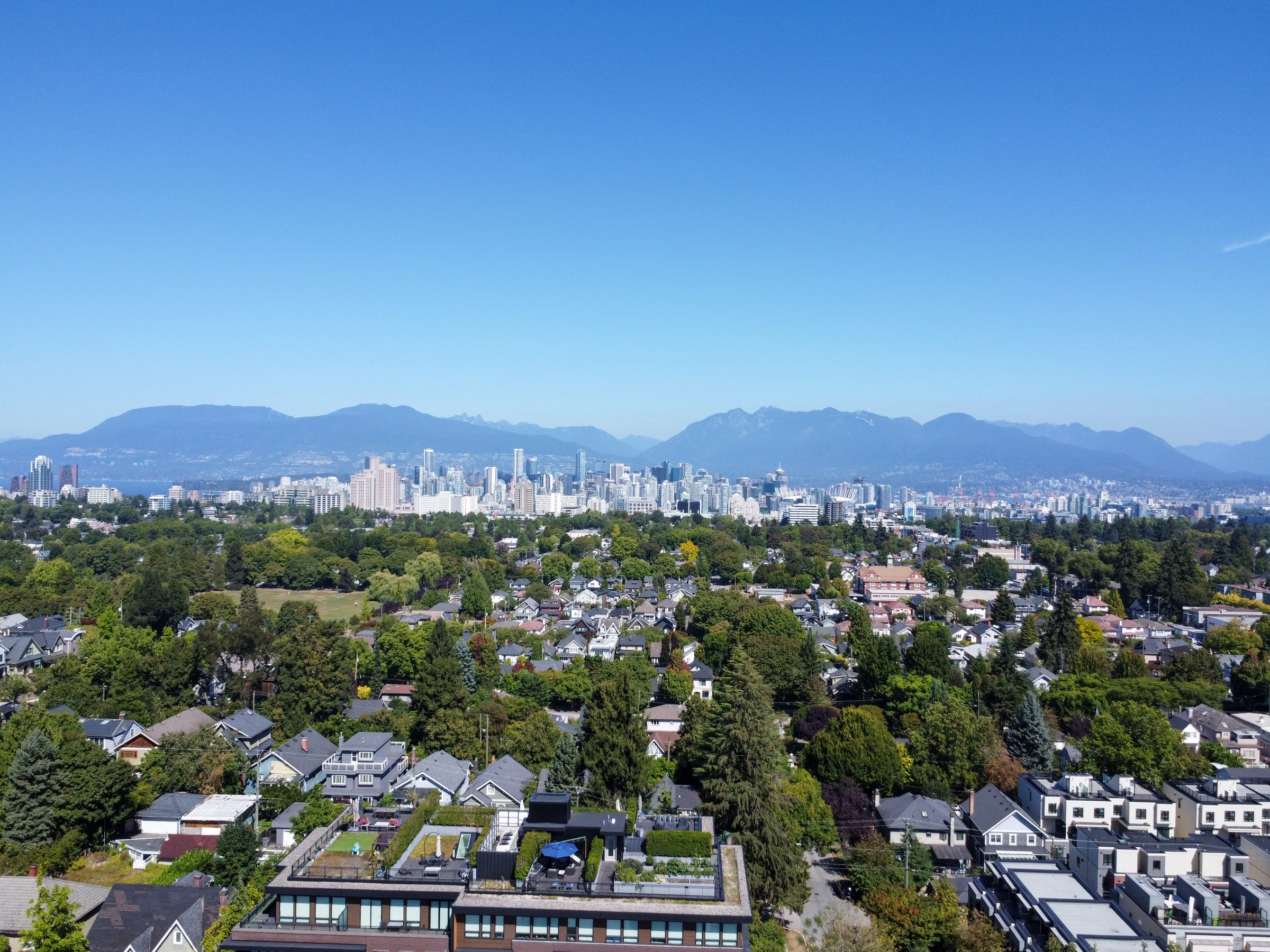 Wide drone panorama across the King Edward and Ash neighbourhood